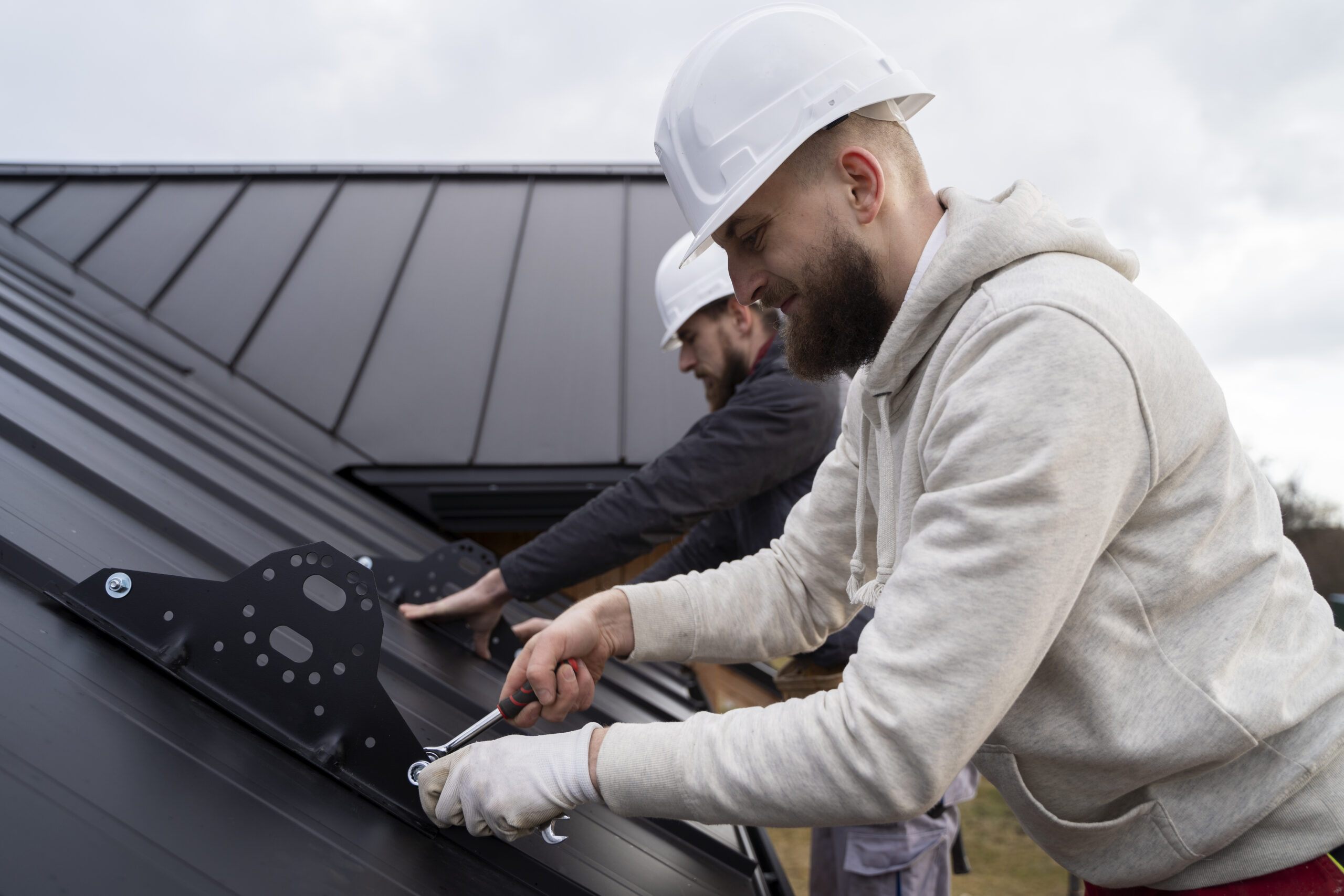 Roofing Workers replacing the roof